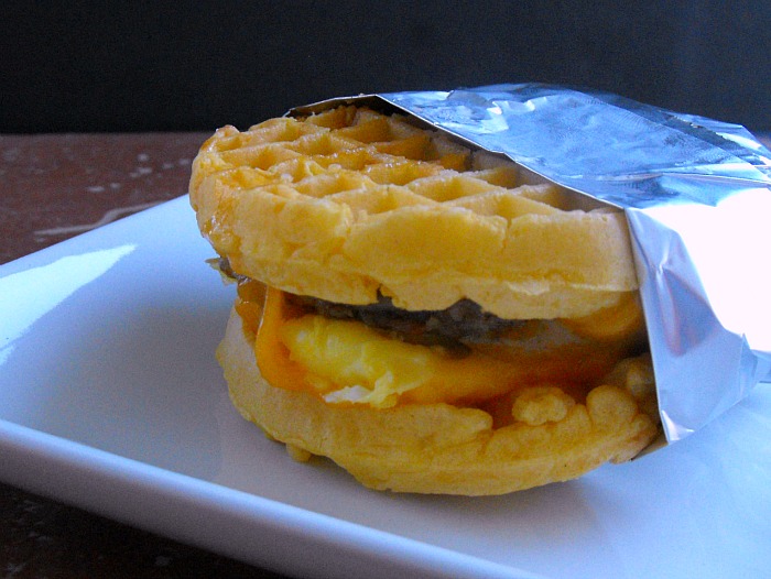 Waffle Sandwich Olè featuring Aunt Jemima Frozen Waffles, eggs, sausage, cheese and salsa butter #breakfastonthego #4morewaffles #shop