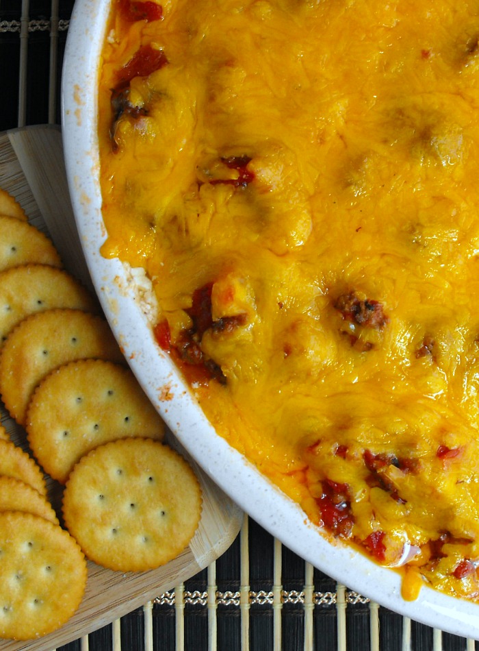 Goulash Dip: layers of ground beef with tomatoes and bell peppers and cheese, lots and lots of cheese!