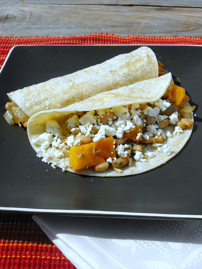 Chicken and Sweet Potato Burritos, a lighter style burrito with beans, caramelized onions, chicken, sweet potatoes and cotija cheese.